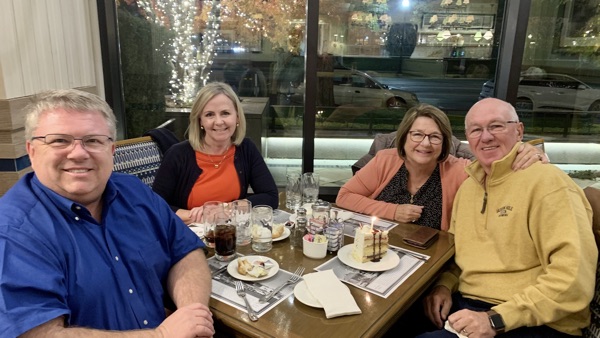 Presidents McIff and her husband, Mark, enjoying dinner with President Carlston and his wife, Janet.