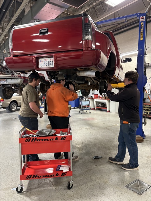 Automotive Technology students work on a truck